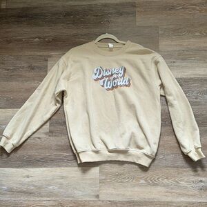 “Disney world” tan sweatshirt size medium